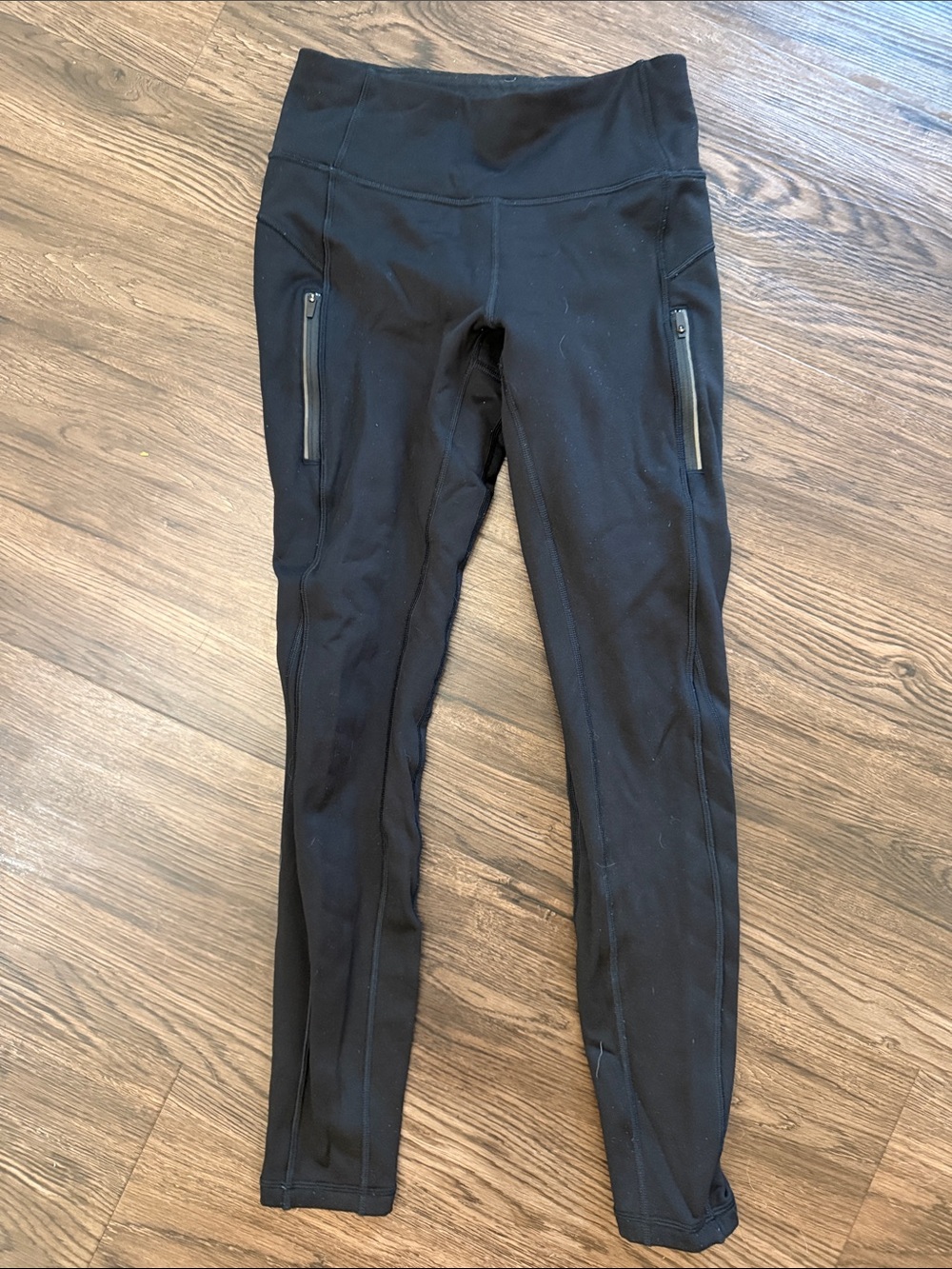 Athleta Fleece Lined Black High-Rise Performance Leggings with Zip Pockets
